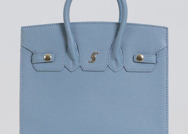 Stylish Medium Leather Bag with Decorative Strap