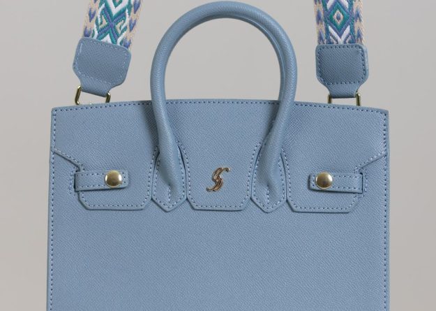 Stylish Medium Leather Bag with Decorative Strap